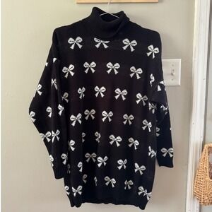 vntg. black & white bow sweater